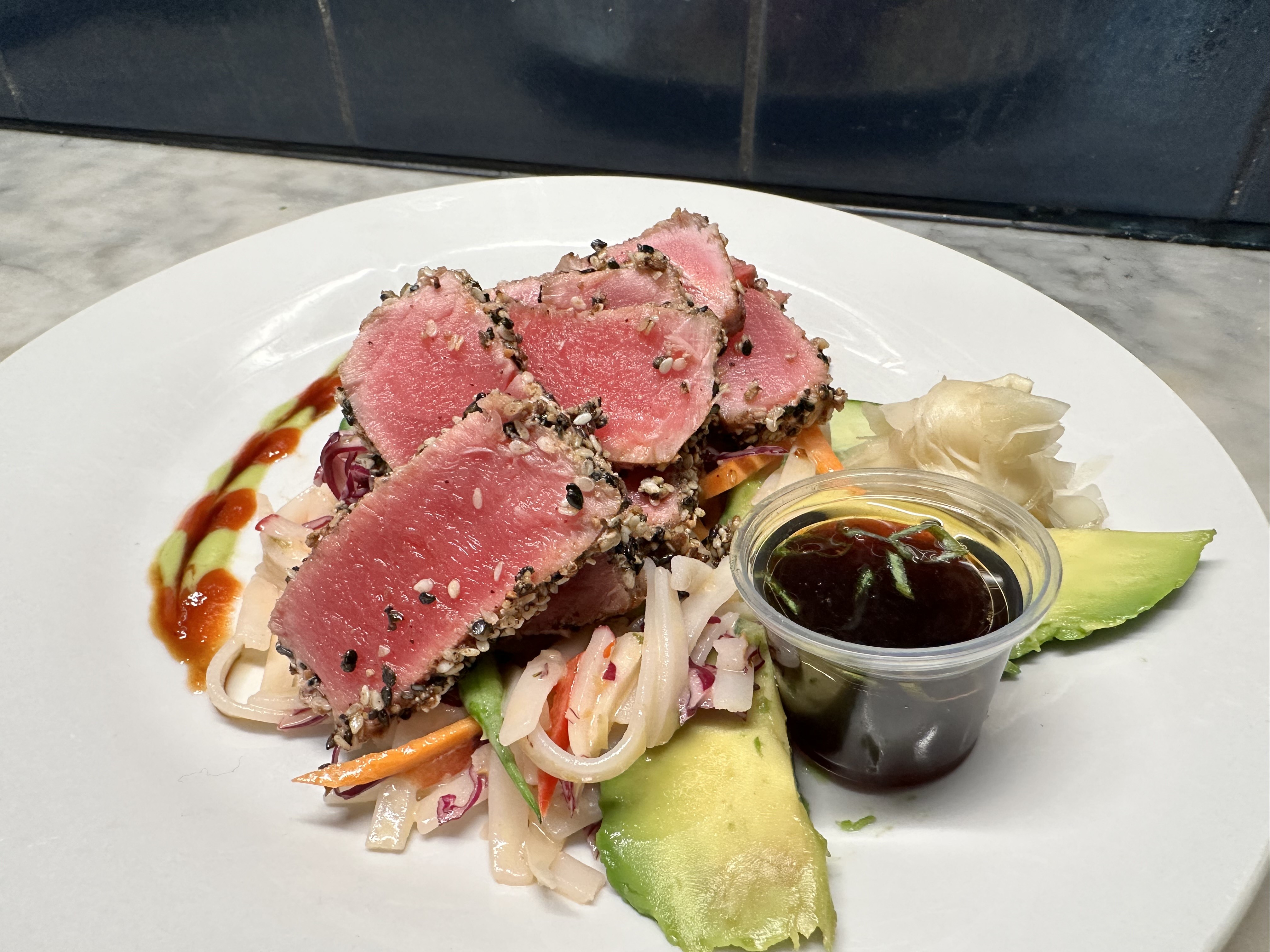 Herb-crusted pork tenderloin with seasonal vegetables - in-home private chef service